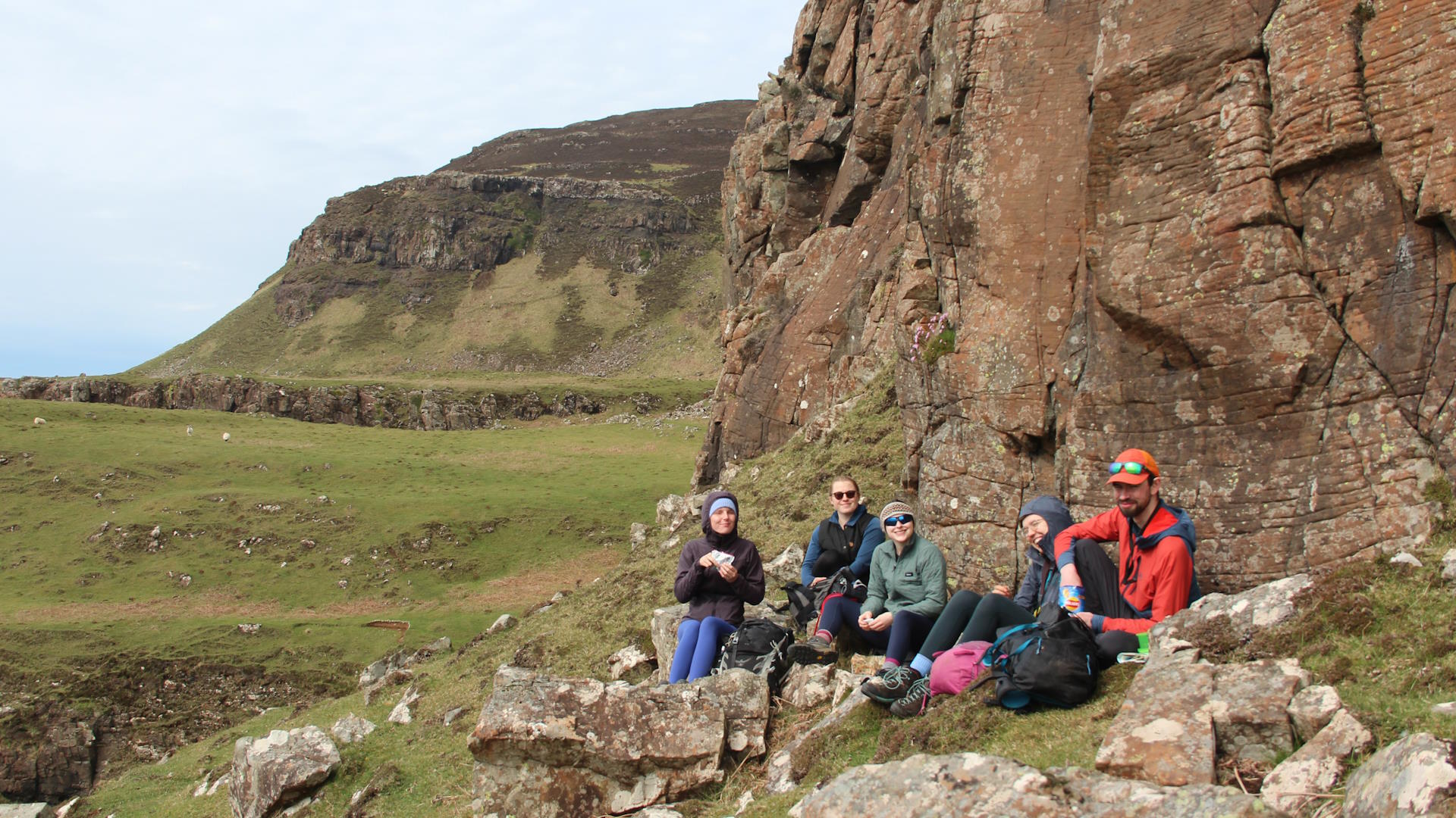 Sandwiches and smiles underneath the crags of the Treshnish coast.