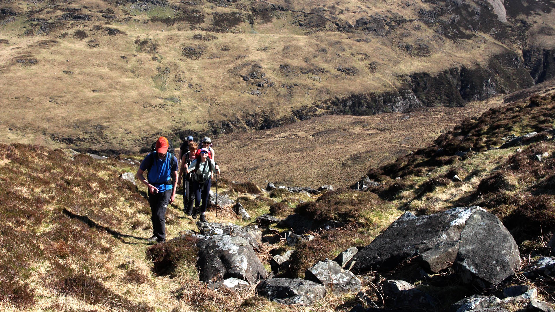 Happy faces on the steep ascent from Loch na Keal to Beinn Fhada.